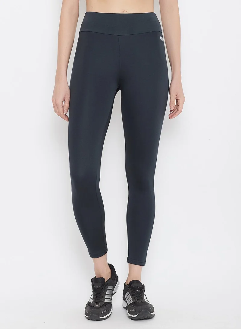 Clovia Blue Snug Fit Active High-Rise Tights in Navy for Women | Best Price UAE